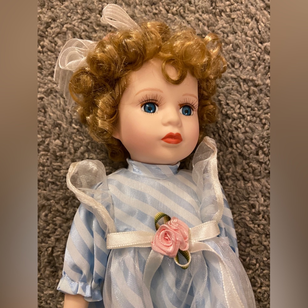 Blue Striped Porcelain Doll with Pink Rose Accent